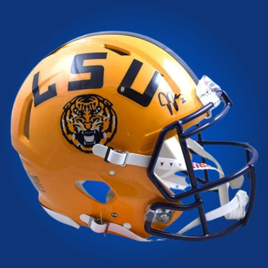 Autographed LSU Tigers full size framed helmet signed by Justin Jefferson, displayed on a white background. SportsMarkets official memorabilia image.