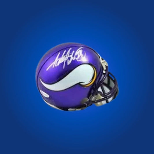Minnesota Vikings mini helmet signed by Justin Jefferson with Certificate of Authenticity.