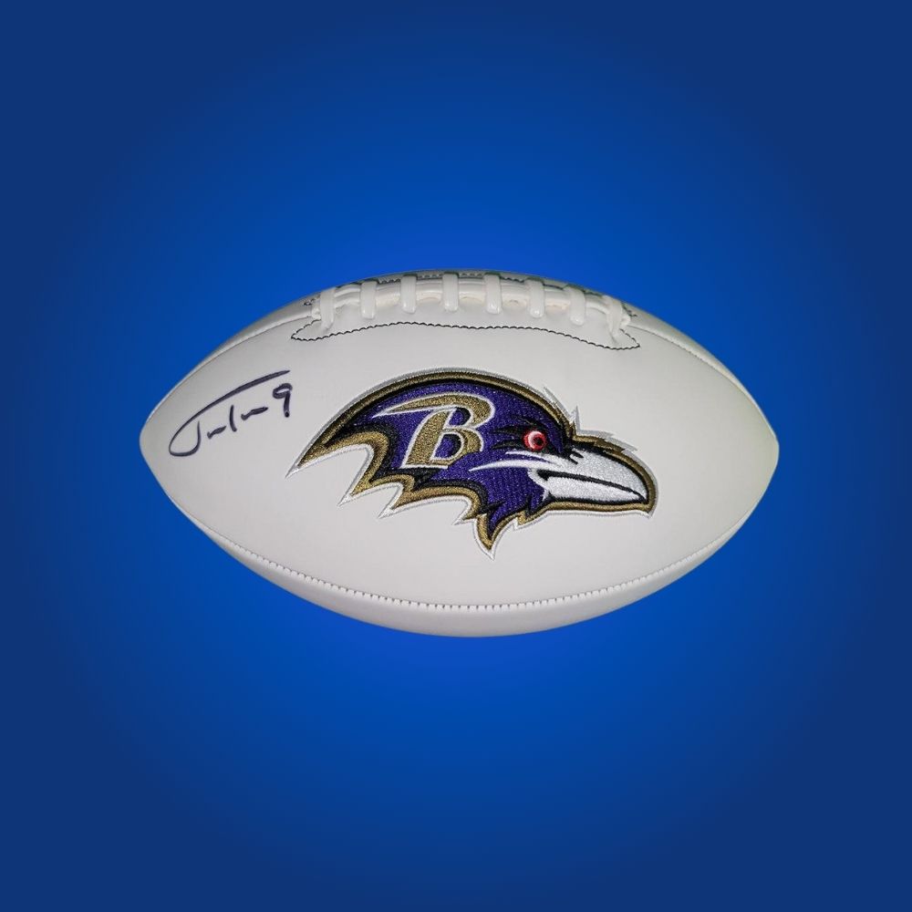 Justin Tucker signed Baltimore Ravens logo football, certified authentic—ideal for Ravens supporters and memorabilia collections.