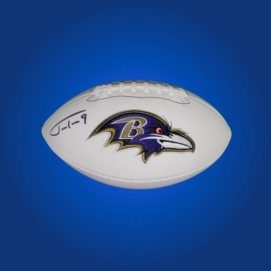 Justin Tucker signed Baltimore Ravens logo football, certified authentic—ideal for Ravens supporters and memorabilia collections.