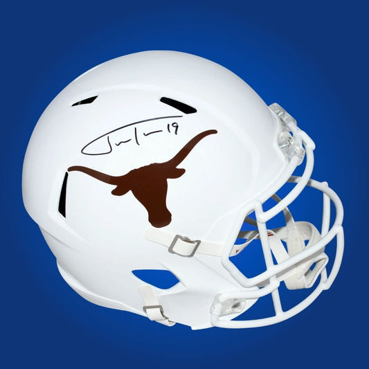 Autographed full size Authentic Helmet by Justin Tucker, legendary Texas Longhorns kicker, presented on a white backdrop for professional product clarity. An ideal collectible for fans and memorabilia displays. SportsMarkets memorabilia photo.