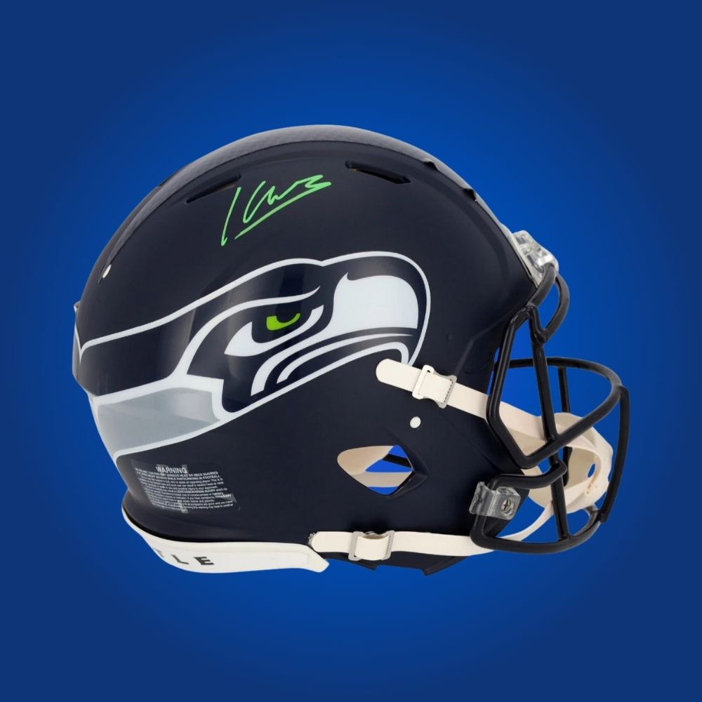 Kenneth Walker hand-signed authentic Seattle Seahawks helmet, showcasing signature and official team graphics. A unique collectible for Seahawks fans and Walker memorabilia collectors. Includes Certificate of Authenticity. Images may differ for catalog uniformity.