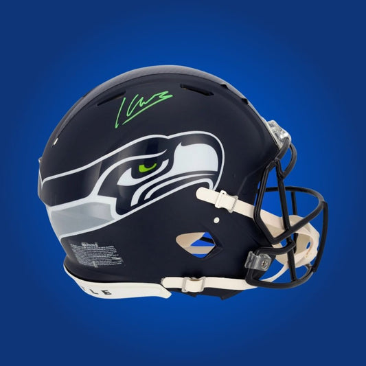Kenneth Walker hand-signed authentic Seattle Seahawks helmet, showcasing signature and official team graphics. A unique collectible for Seahawks fans and Walker memorabilia collectors. Includes Certificate of Authenticity. Images may differ for catalog uniformity.