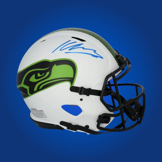 Kenneth Walker hand-signed whiteout authentic Seattle Seahawks helmet, showcasing signature and official team graphics. A unique collectible for Seahawks fans and Walker memorabilia collectors. Includes Certificate of Authenticity. Images may differ for catalog uniformity.
