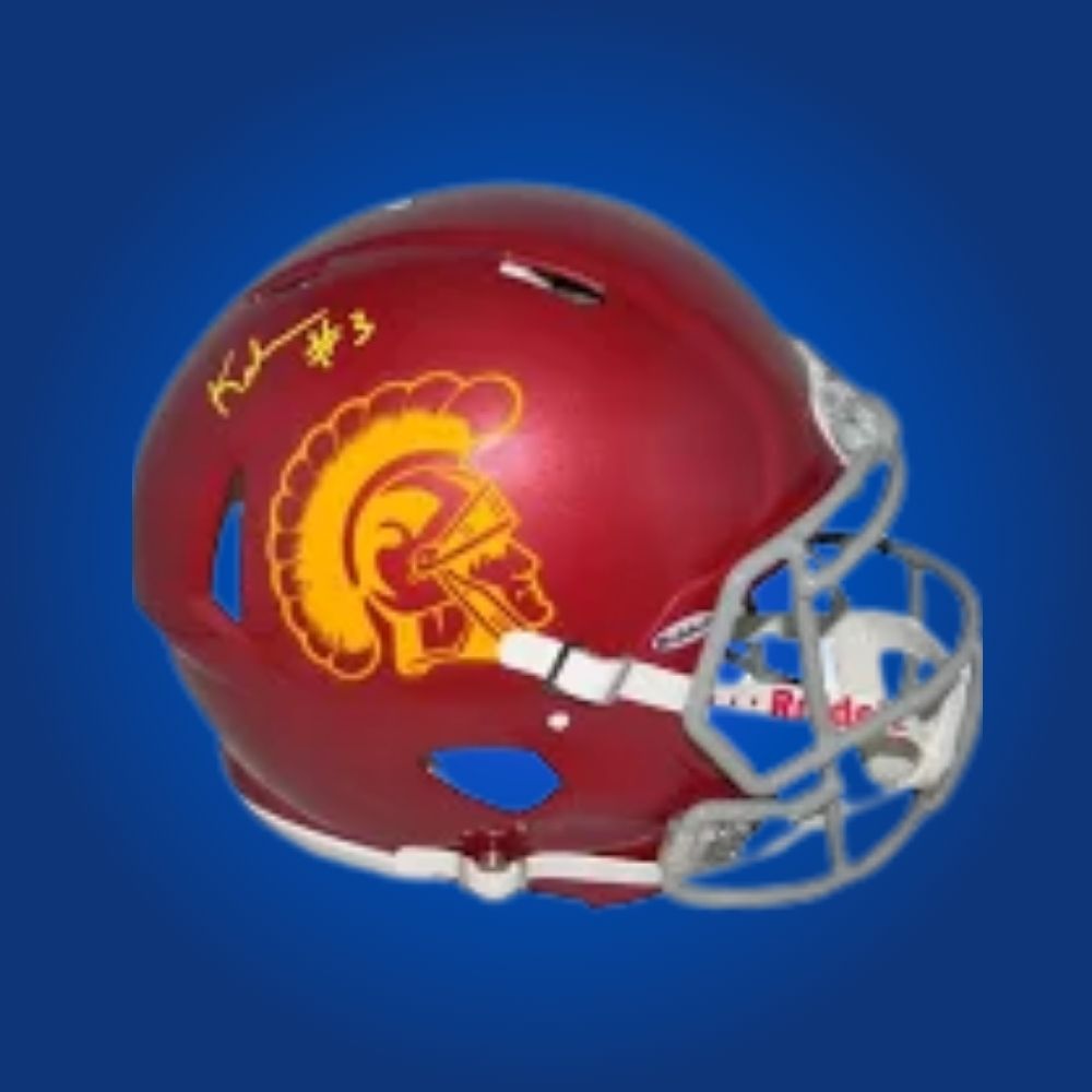 Autographed full size replica helmet by Keyshawn Johnson, celebrated USC Trojans wide receiver and NFL standout, presented against a white background for a professional display. Excellent for memorabilia enthusiasts and Trojans collectors. SportsMarkets product photo.
