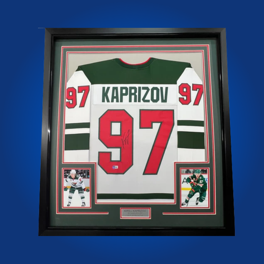 Kirill Kaprizov’s autographed full framed Minnesota Wild white jersey, featuring the dynamic winger’s signature, is a must-have for fans and collectors, celebrating his electrifying impact in Minnesota.