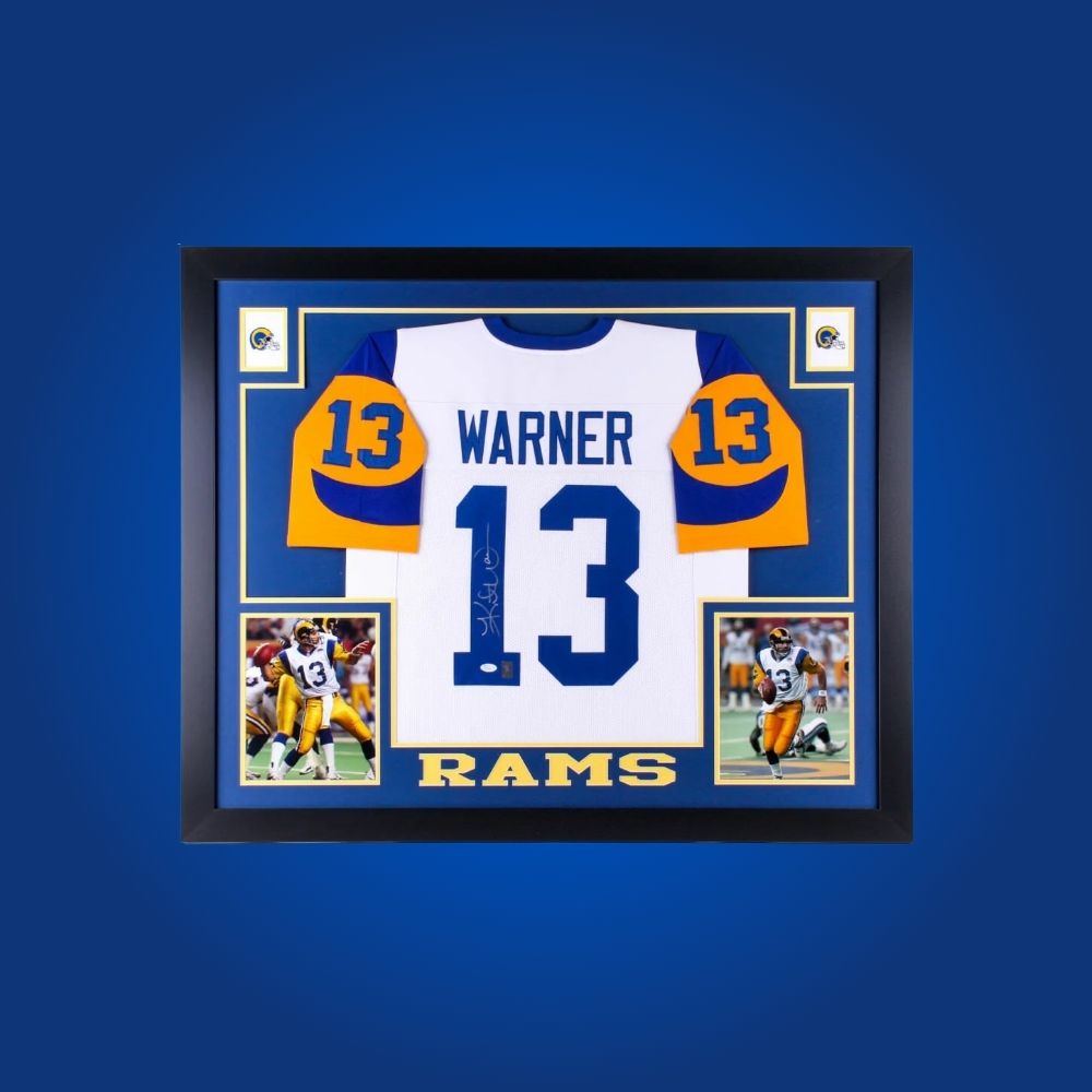 Autographed Los Angeles Rams custom jersey by Kurt Warner with Certificate of Authenticity.