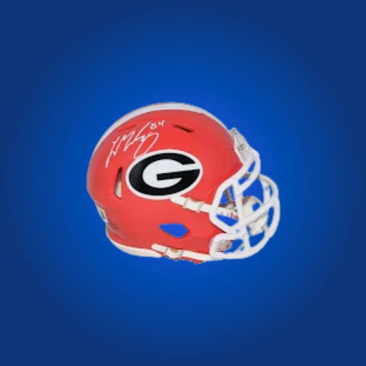 Ladd McConkey autographed Georgia Bulldogs mini helmet, must-have collectible for Georgia supporters and McConkey enthusiasts.