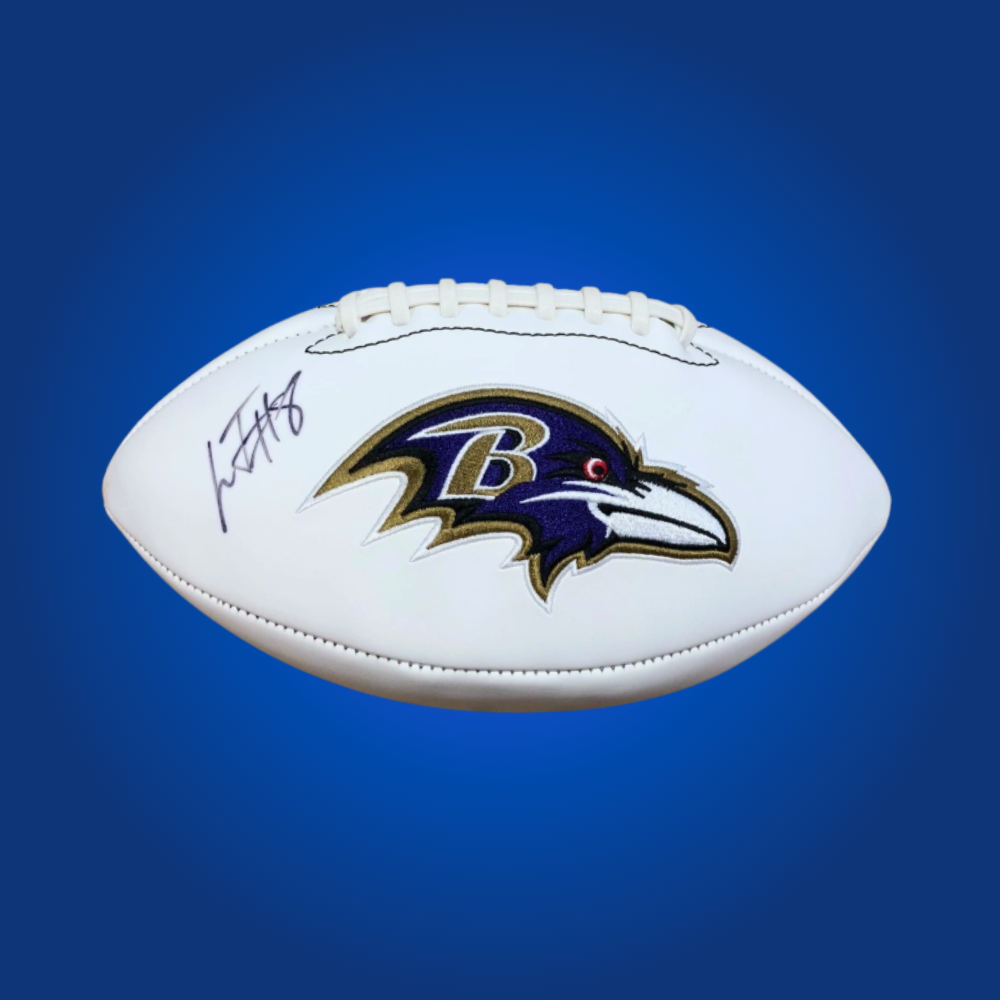 Lamar Jackson signed Baltimore Ravens logo football, featuring his autograph, great for Ravens fans and NFL collectors.