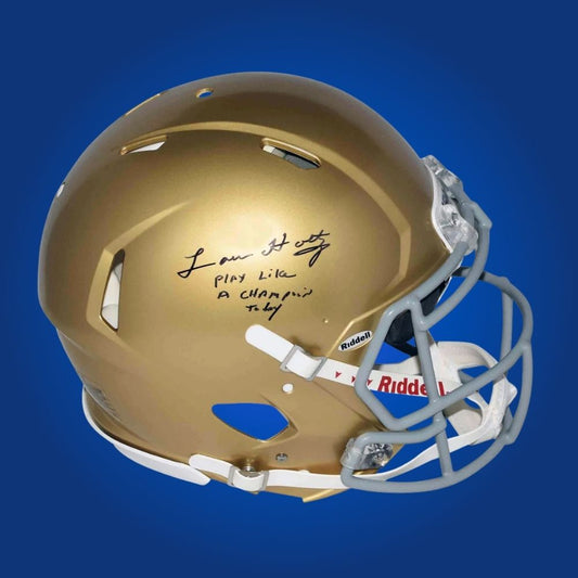 Autographed Notre Dame Fighting Irish full size Authentic Helmet signed by Lou Holtz, featured on a white background. SportsMarkets collectible product photo.