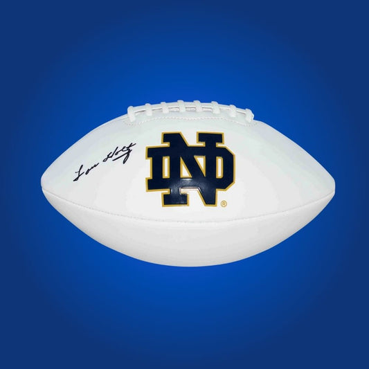 Lou Holtz autographed Notre Dame Fighting Irish white logo football, unique item for Notre Dame supporters and memorabilia collectors.