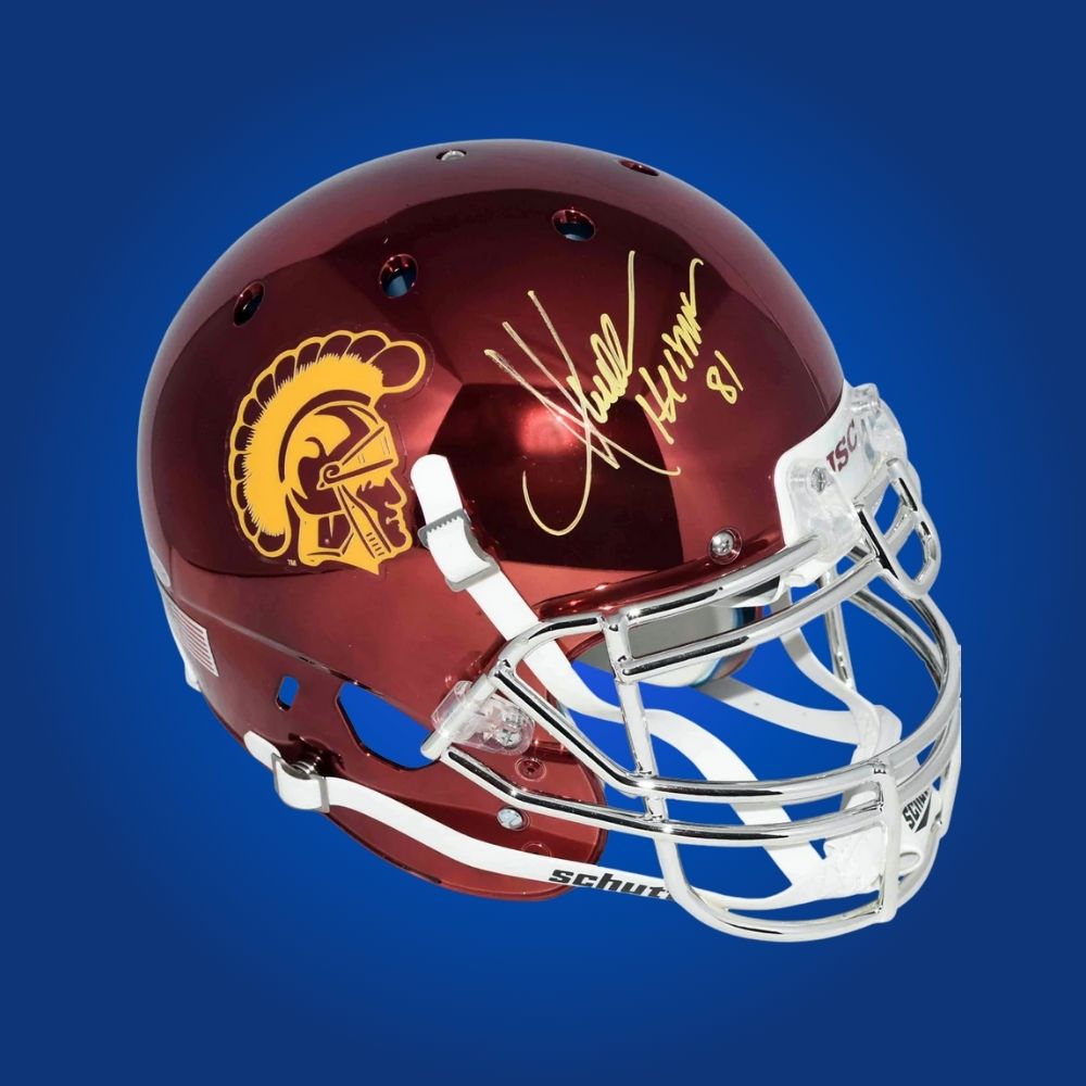 Autographed full size Authentic Helmet by Marcus Allen, USC Trojans icon and Heisman Trophy winner, professionally displayed on a crisp white backdrop. An essential piece for collectors and Trojans fans. SportsMarkets memorabilia image.