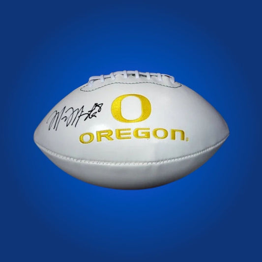 Marcus Mariota autographed Oregon Ducks white logo football, special memorabilia for dedicated Oregon supporters and collectors.