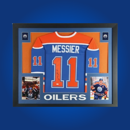 Mark Messier’s full framed Edmonton Oilers blue jersey, signed and authenticated, honors the Hall of Fame captain’s leadership and championship legacy with the Oilers.
