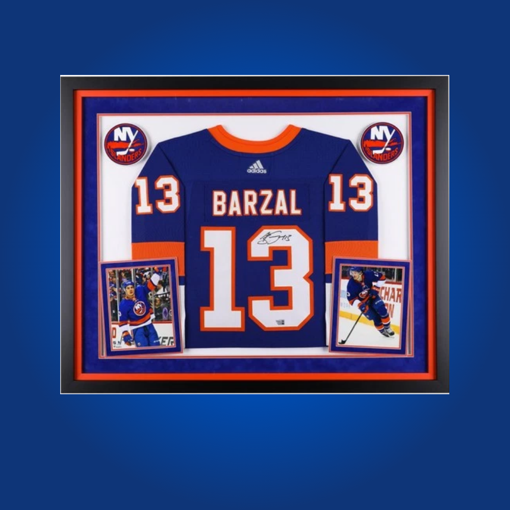 Mathew Barzal’s full framed New York Islanders blue jersey, autographed, is a prized collectible for fans, spotlighting the dynamic forward’s playmaking and leadership.