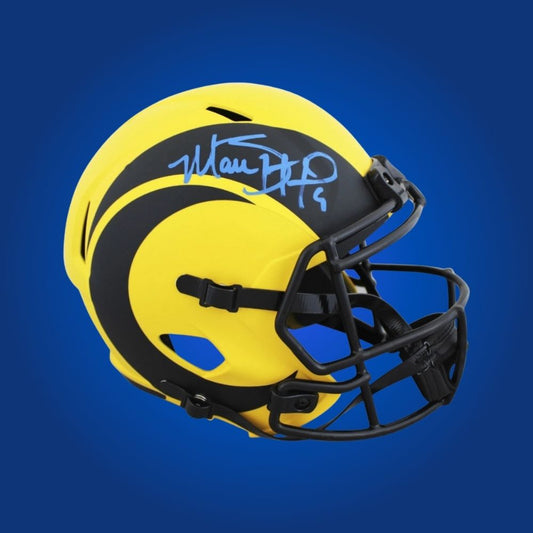 Matthew Stafford hand-signed Los Angeles Rams replica helmet, showcasing signature and official team graphics. A unique collectible for Rams fans and Stafford memorabilia collectors. Includes Certificate of Authenticity. Images may differ for catalog uniformity.