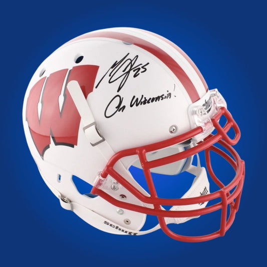 Autographed full size Authentic Helmet by Melvin Gordon, standout Wisconsin Badgers running back, set against a clean white background for optimal product presentation. Great for memorabilia enthusiasts and Badgers supporters. SportsMarkets photo.