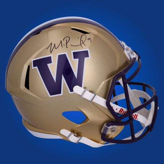 Autographed full size replica helmet by Michael Penix Jr., dynamic Washington Huskies quarterback and Heisman finalist, presented against a clean white backdrop for clarity. A top collectible for Huskies fans and sports memorabilia enthusiasts. SportsMarkets product photo.