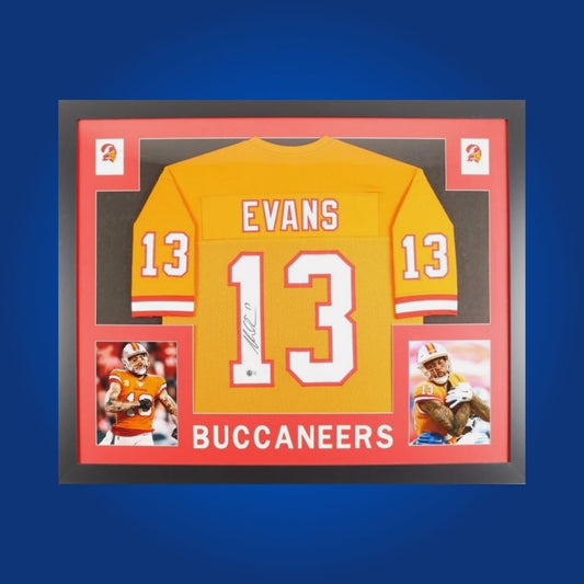 Framed Tampa Bay Buccaneers jersey signed by Mike Evans with action photos and Certificate of Authenticity.