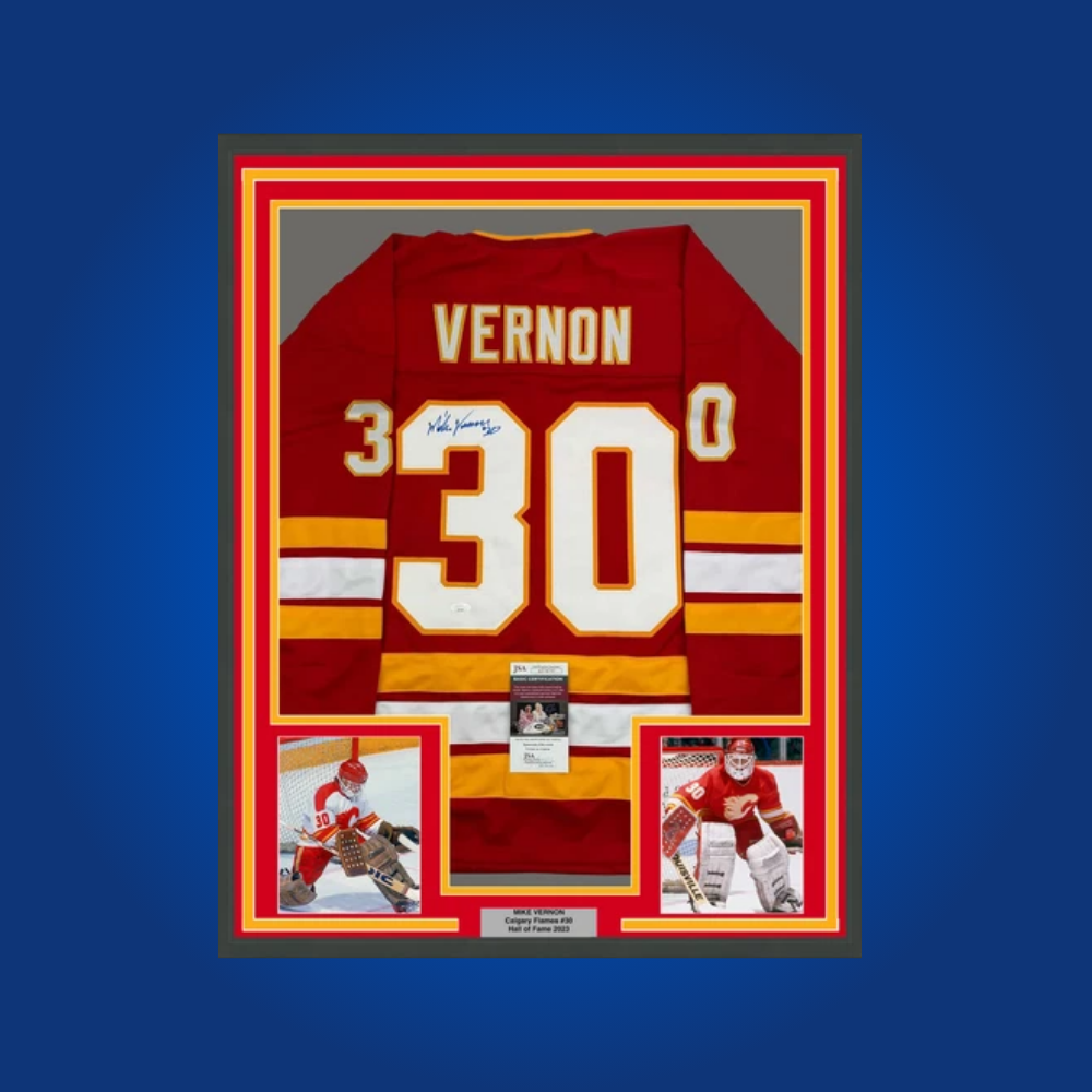 Mike Vernon’s signed and framed Calgary Flames red jersey is an excellent addition for collectors, commemorating the goaltender’s pivotal role in the team’s history.