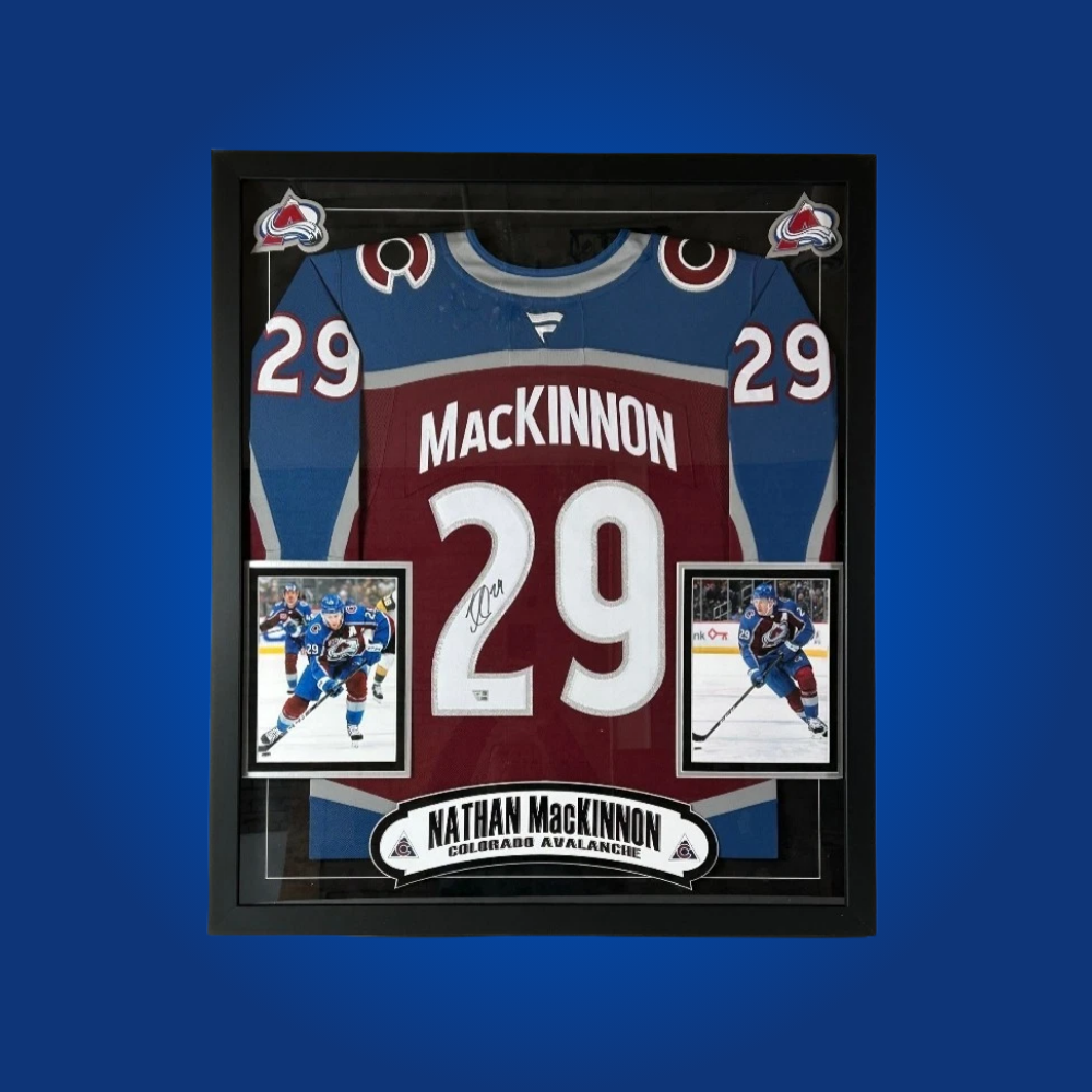 Nathan MacKinnon’s full framed Colorado Avalanche burgundy jersey, hand-signed, is a prized collectible for fans, capturing the dynamism and leadership of a modern NHL superstar.