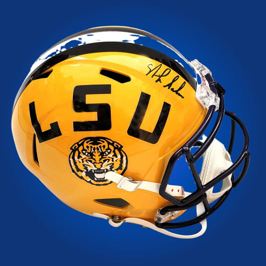 Autographed LSU Tigers full size replica helmet signed by Nick Saban, featured on a clean white background. SportsMarkets product photo.
