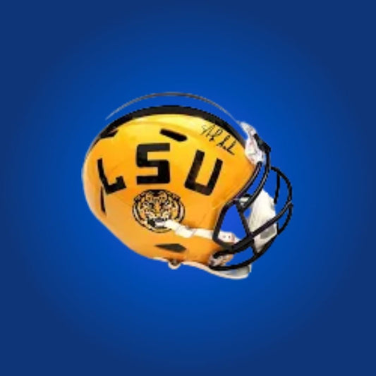 Nick Saban autographed LSU Tigers mini helmet—rare coaching collectible for LSU fans and memorabilia enthusiasts.
