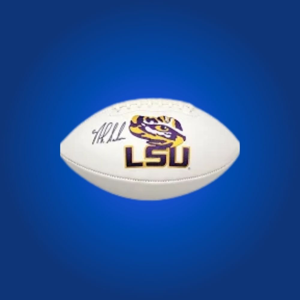 Nick Saban signed LSU Tigers white logo football, unique collectible for passionate LSU Tigers fans and memorabilia collectors.