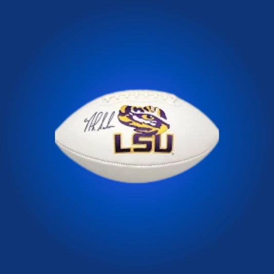 Nick Saban signed LSU Tigers white logo football, unique collectible for passionate LSU Tigers fans and memorabilia collectors.
