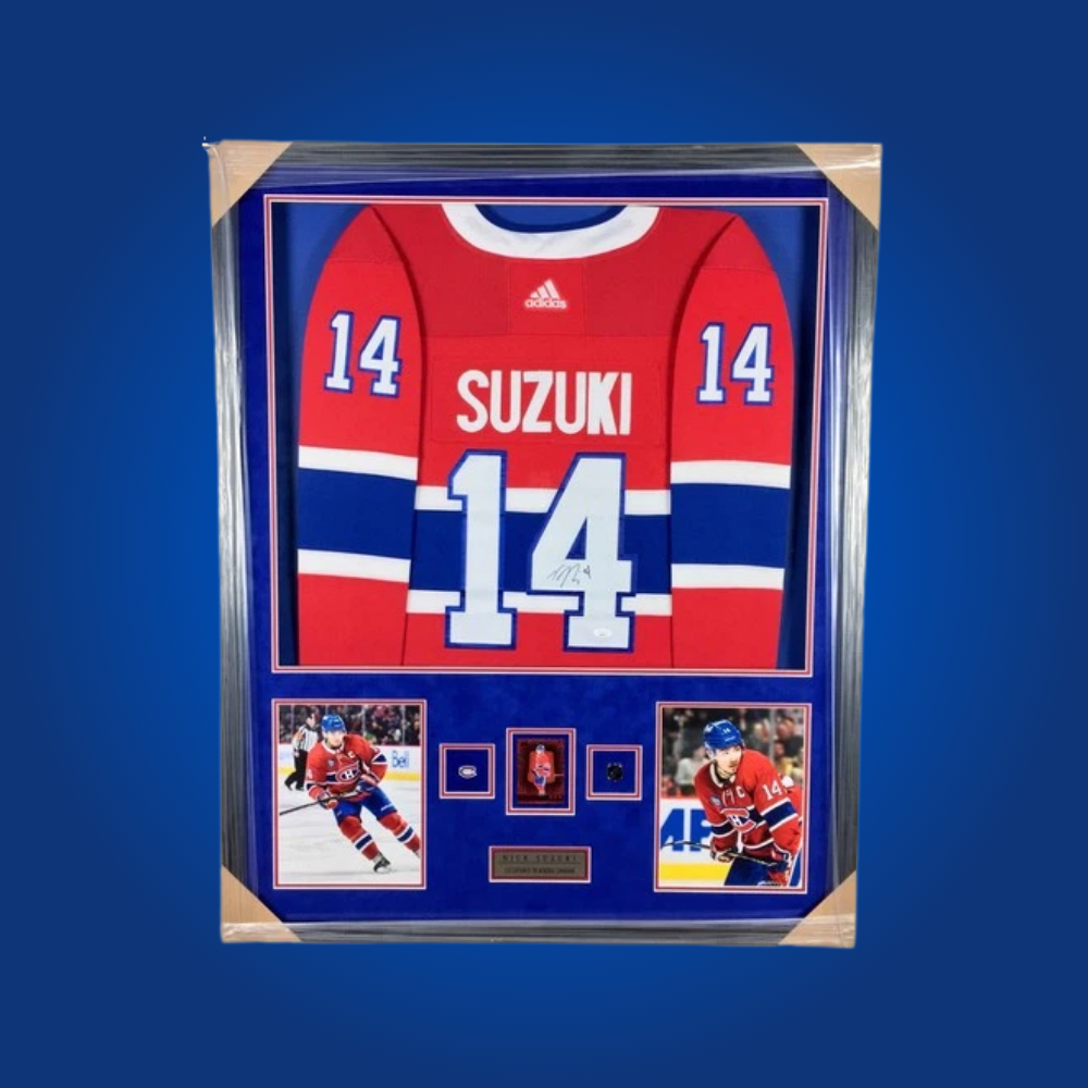 Nick Suzuki’s full framed Montreal Canadiens red jersey, hand-signed, is a standout collectible for fans of the team’s current captain and a symbol of the franchise’s exciting new era.