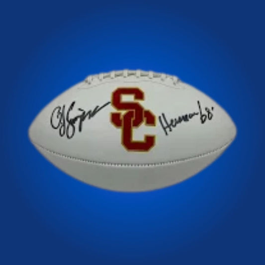Autographed full size replica football by O.J. Simpson, featuring USC Trojans white logo. Certified authentic, an iconic collectible for USC fans and football memorabilia enthusiasts. Certificate of Authenticity included. Ball details may differ for catalog consistency.