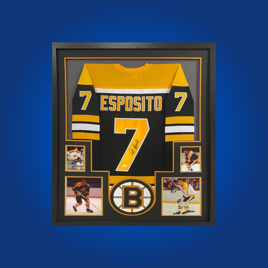 Celebrate Phil Esposito’s storied career with this full framed Boston Bruins white jersey, hand-signed by the Hall of Famer. An essential collectible for fans and hockey historians alike.