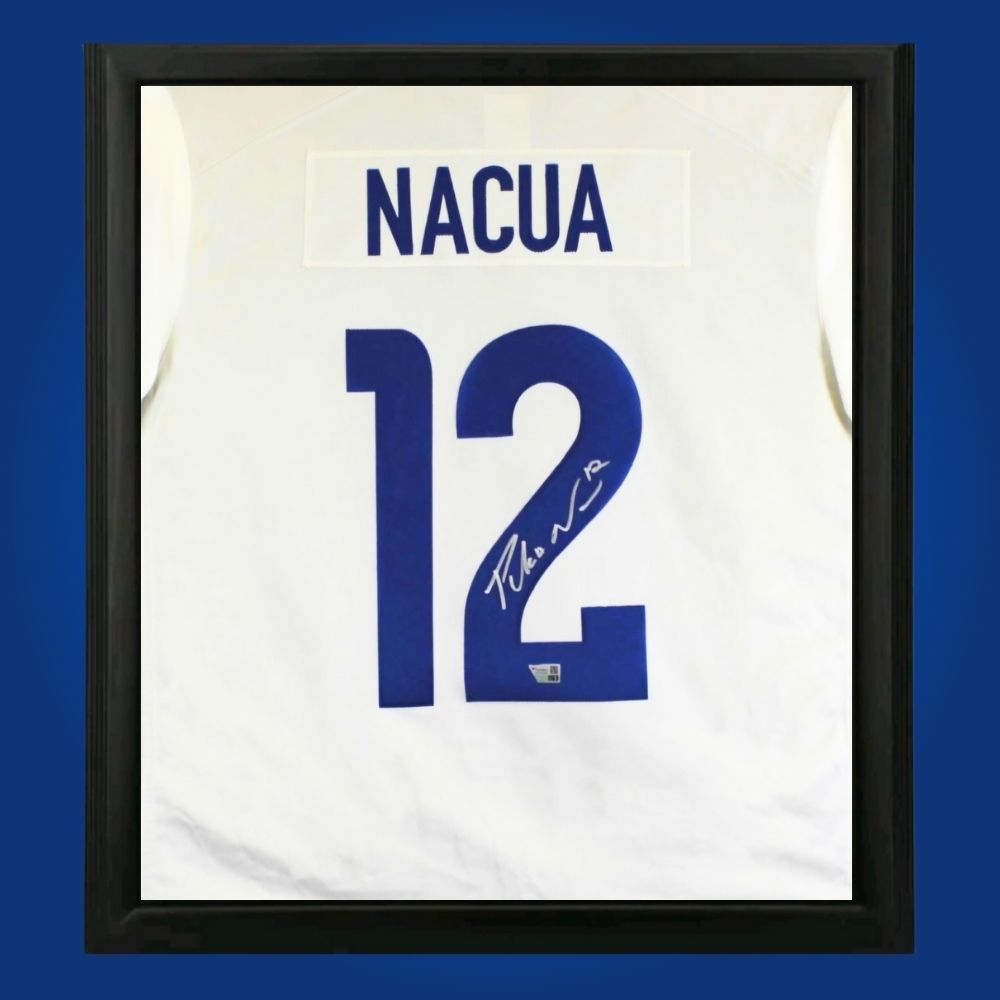Puka Nacua hand-signed Los Angeles Rams framed jersey, showcasing signature and official team graphics. A unique collectible for Rams fans and Nacua memorabilia collectors. Includes Certificate of Authenticity. Images may differ for catalog uniformity.
