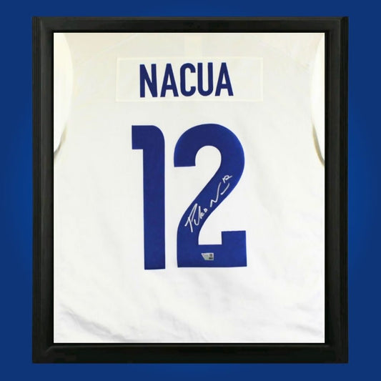 Puka Nacua hand-signed Los Angeles Rams framed jersey, showcasing signature and official team graphics. A unique collectible for Rams fans and Nacua memorabilia collectors. Includes Certificate of Authenticity. Images may differ for catalog uniformity.