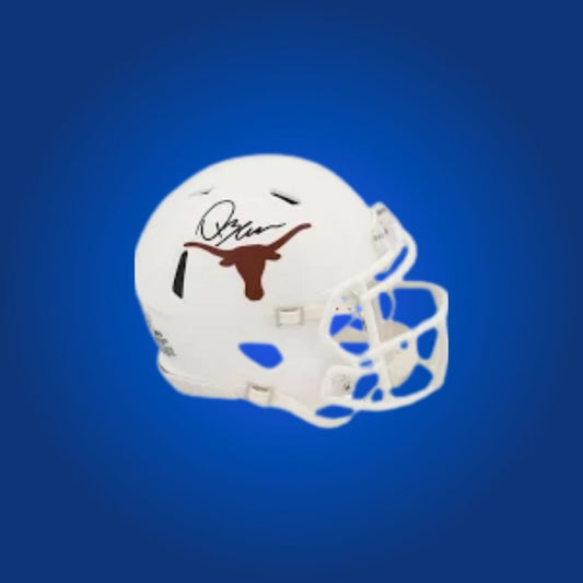 Quinn Ewers signed Texas Longhorns mini helmet—premium keepsake for Texas fans and Ewers supporters.