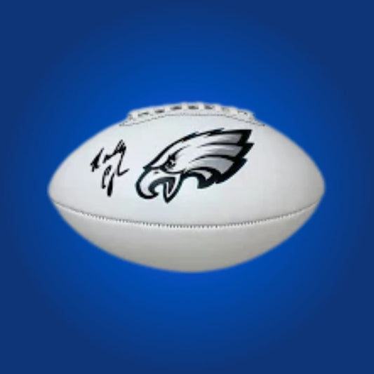 Randall Cunningham autographed Eagles logo football, featuring team logo and quarterback signature.