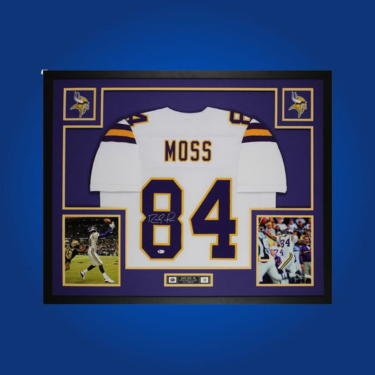 Autographed Minnesota Vikings custom jersey by Randy Moss with Certificate of Authenticity.