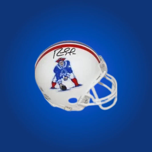 New England Patriots mini helmet signed by Randy Moss with Certificate of Authenticity.