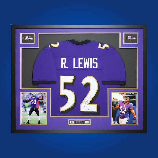 Autographed Baltimore Ravens custom jersey by Ed Reed with Certificate of Authenticity.