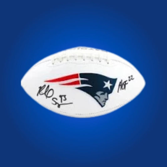New England Patriots logo football autographed by Richard Seymour, signature clearly visible.
