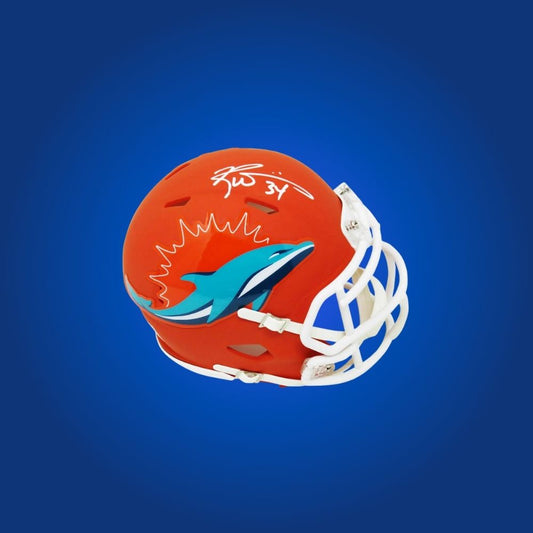 Miami Dolphins mini helmet signed by Ricky Williams with Certificate of Authenticity.