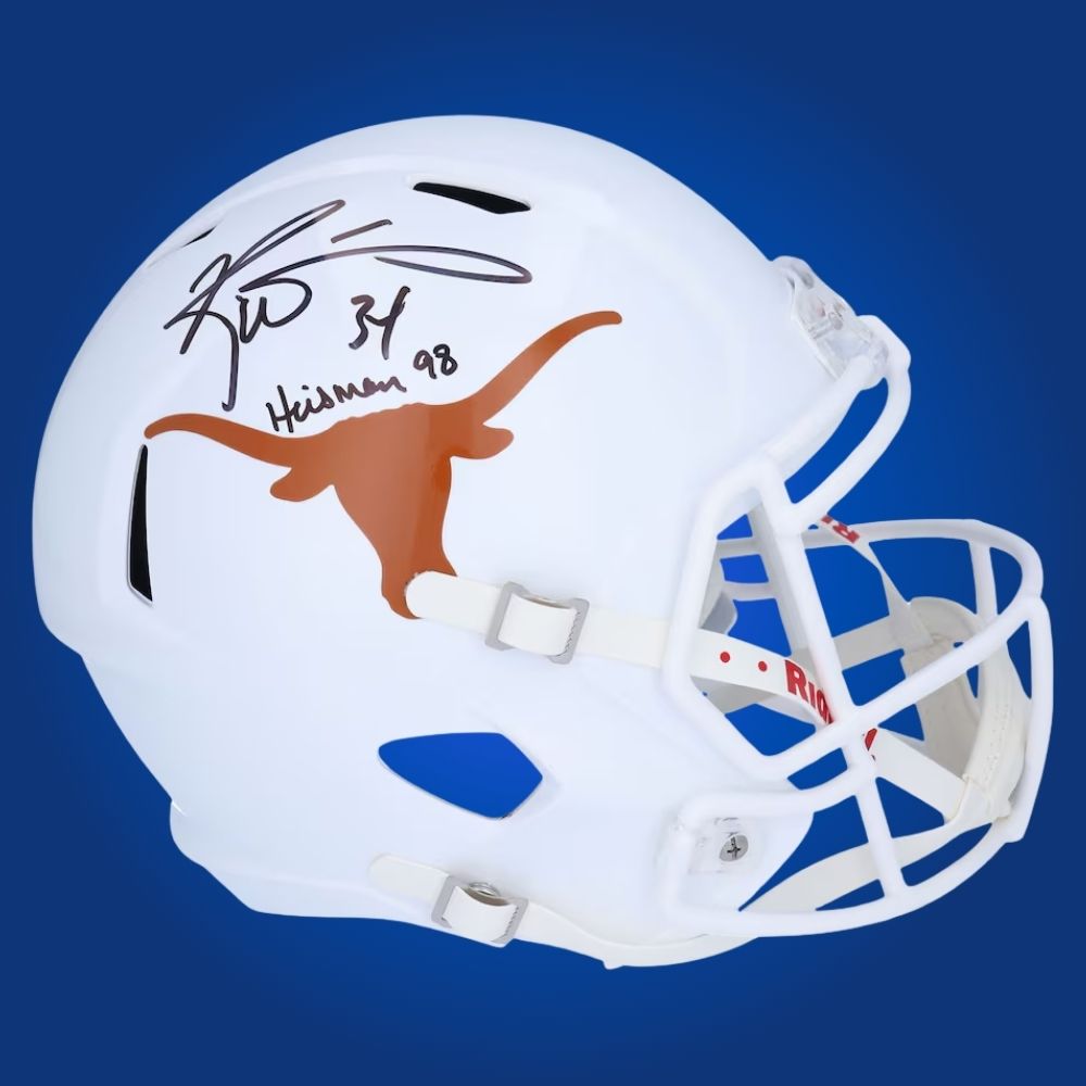Autographed full size replica helmet by Ricky Williams, Heisman Trophy winner and Texas Longhorns legend, set against a pristine white background. Ideal for memorabilia collections. SportsMarkets product photo.