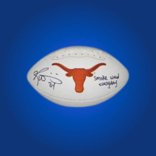 Autographed full size replica football by Ricky Williams, featuring Texas Longhorns white logo. Certified authentic, a must-have for Longhorns fans and memorabilia enthusiasts. Includes Certificate of Authenticity. Ball details may vary for catalog consistency.