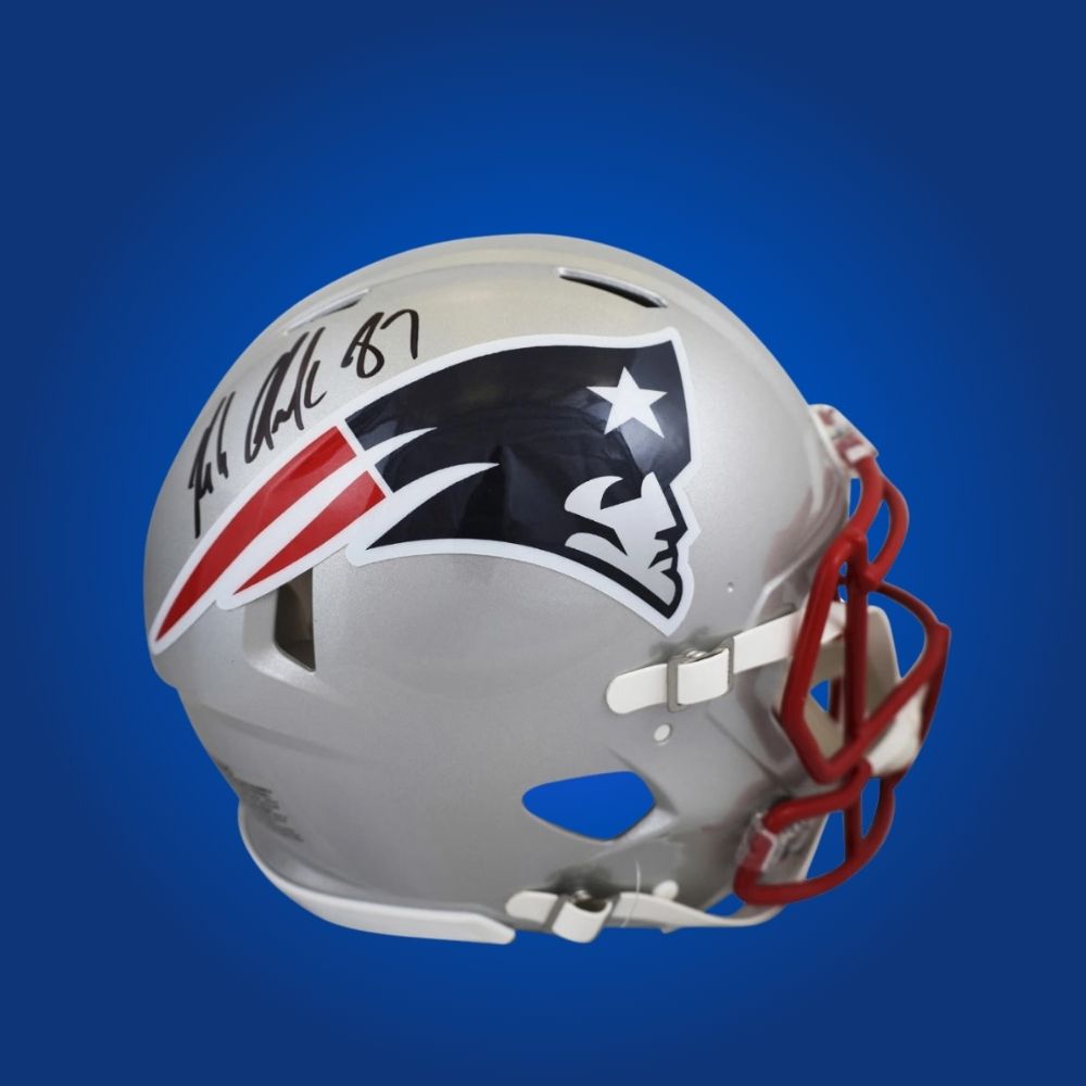 Rob Gronkowski hand-signed New England Patriots authentic helmet, showcasing signature and official team graphics. A unique collectible for Patriots fans and Gronkowski memorabilia collectors. Includes Certificate of Authenticity. Images may differ for catalog uniformity.
