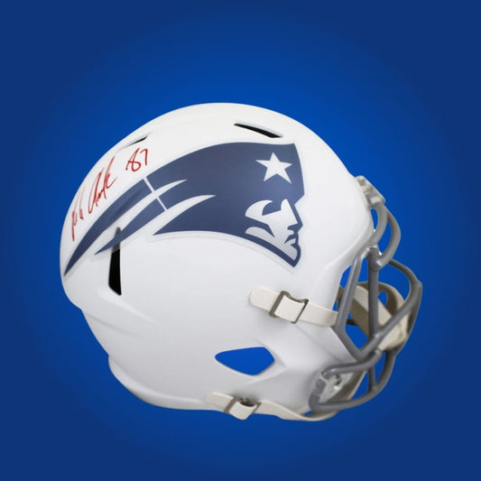 Rob Gronkowski hand-signed New England Patriots white replica helmet, showcasing signature and official team graphics. A unique collectible for Patriots fans and Gronkowski memorabilia collectors. Includes Certificate of Authenticity. Images may differ for catalog uniformity.