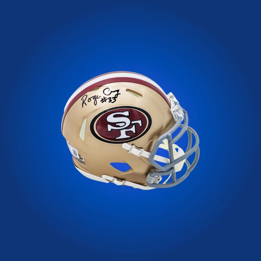 San Francisco 49ers mini helmet signed by Roger Craig with Certificate of Authenticity.