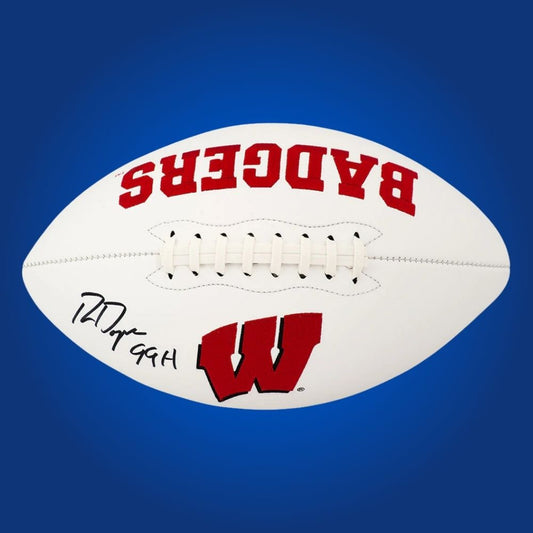 Autographed full size replica football by Ron Dayne, featuring Wisconsin Badgers white logo. Certified authentic, a great addition for Badgers fans and memorabilia collectors. Certificate of Authenticity included. Ball details may vary for catalog consistency.