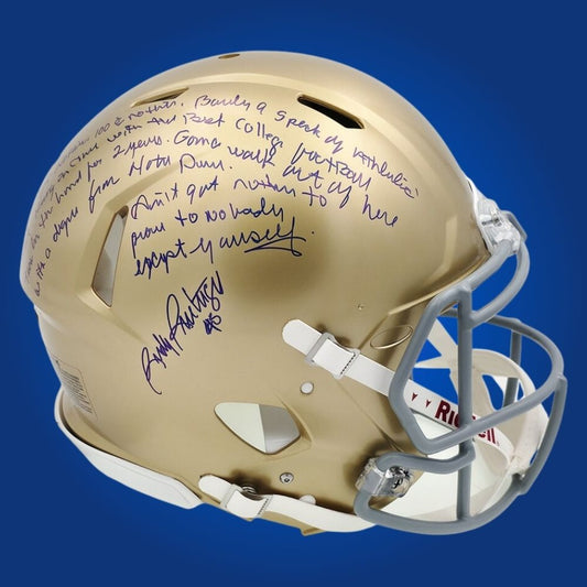 Autographed Notre Dame Fighting Irish full size Authentic Helmet signed by Rudy Ruettiger, displayed on a white backdrop. SportsMarkets collectible product image.