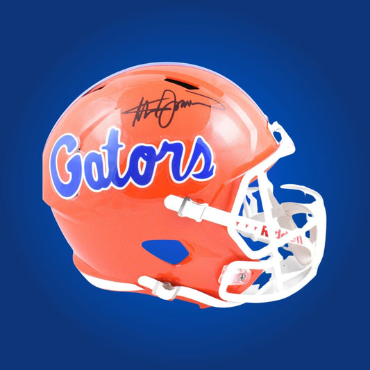 Autographed Florida Gators full size replica helmet signed by Steve Spurrier, featured on a white background. SportsMarkets collectible image.