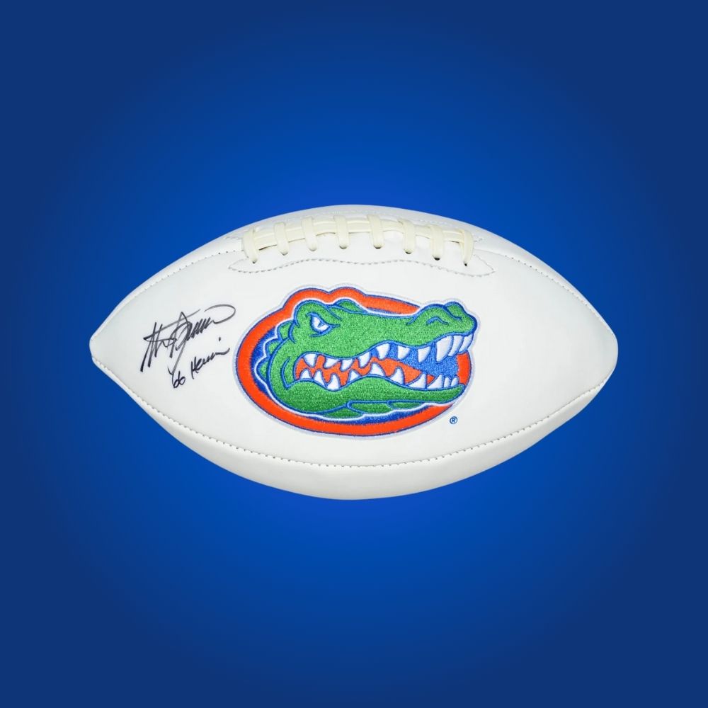 Steve Spurrier autographed Florida Gators white logo football, unique memorabilia for Gators fans and collectors.